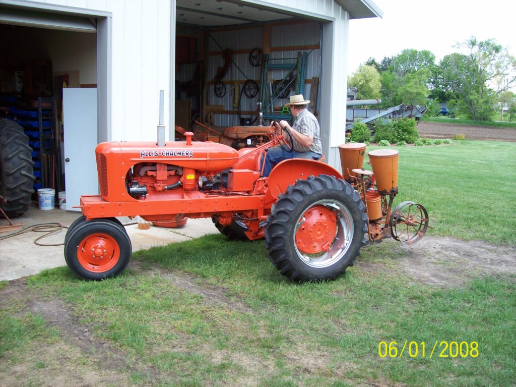 1949 WD My Dad bought it new in March of 1950. Two row drill planter attached