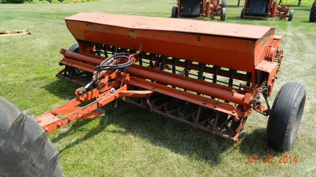 Model 11 x 7 all crop drill with ground drive operation mounted to a WD
