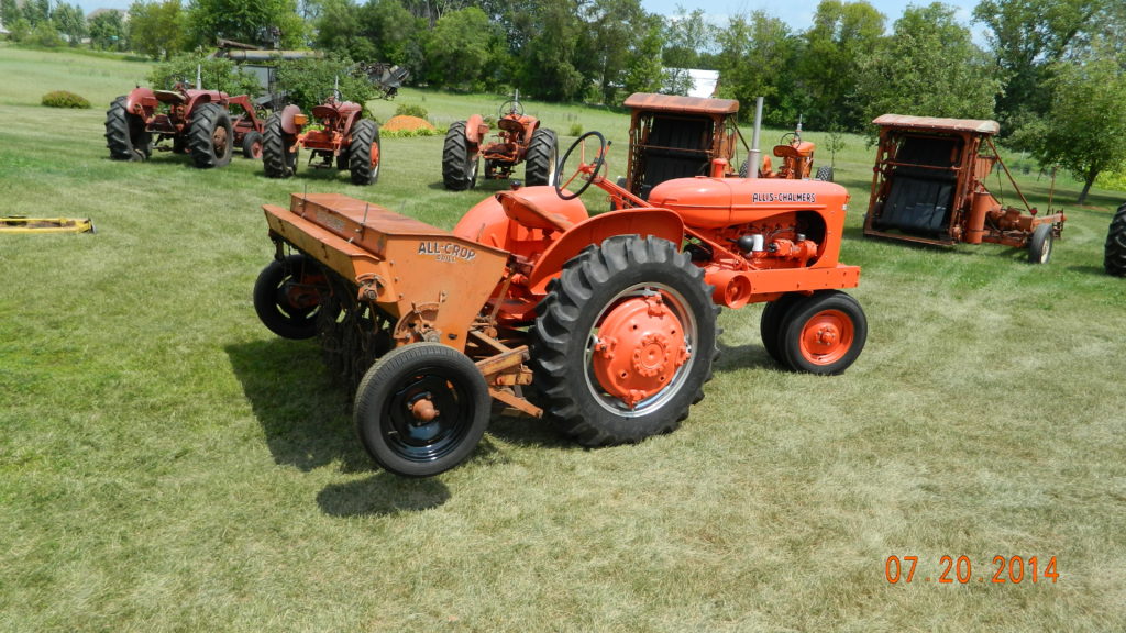 Model 11 x 7 all crop drill with ground drive operation mounted to a WD