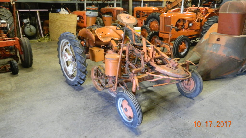 Model G tractor with a two row drill planter